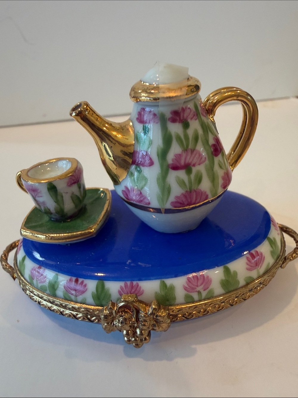 Hand painted Limoges trinket set. Top of kettle comes off. New perfect condition